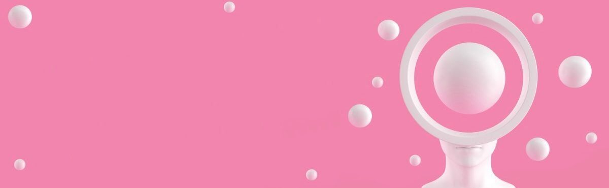 A statute-like head with a white ball and a circle superimposed on top against a pink background.
